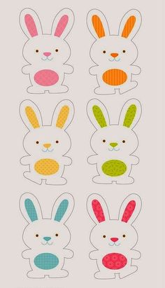 four bunny cut outs with different colors and sizes