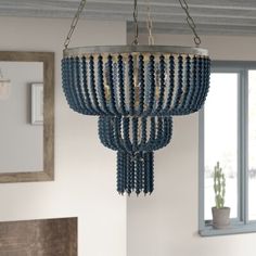 a blue chandelier hanging from the ceiling