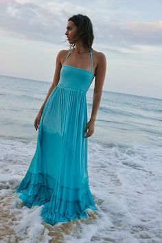 Strapless Halter Dress For Beach Season, Strapless Halter Dress For Beach, Bandeau Sundress Maxi For Beach, Flowy Bandeau Beach Dress, Beach Bandeau Dress With Flowy Fit, Flowy Bandeau Dress For The Beach, Strapless Maxi Dress For Beach Party, Strapless Halter Dress For Beach Vacation, Bohemian Bandeau Maxi Dress For Vacation