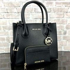 Michael Kors Mercer Crossbody Satchel Bag 100% Authentic New With Tags Retail Price: $498.00 + Tax Handle Drop: 4.25” Adjustable Strap: 22.25”-24.5” Exterior Details: Removable Strap Interior Details: 2 Open Compartments, Center Zip Compartment, 3 Card Pockets 8.75”W X 7.5”H X 4”D Wallet 100% Authentic New With Tags Retail Price: $188.00 + Tax Zip Around Closure Custom Fabric Lining Interior Middle Divider, 4 Card Slots Exterior Front And Back 2 Slip Pockets 4.5”W X 3.25”H X 0.75”D Black Leather Wallet For Shopping, Michael Kors Luxury Wallets For Everyday Use, Luxury Michael Kors Wallet For Everyday, Luxury Michael Kors Wallets For Everyday, Michael Kors Luxury Evening Wallets, Luxury Michael Kors Evening Wallets, Elegant Leather Wallet For Shopping, Michael Kors Leather Wallets For Evening, Michael Kors Leather Evening Wallet