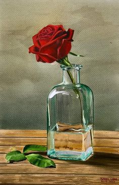 a painting of a single red rose in a glass vase on a wooden table with green leaves