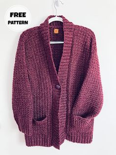 a red cardigan sweater hanging on a hanger with the text free pattern below it