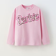 Iong Sleeve Sequin Appliqu Barbie Mattel Size 9-10 Size 11-12 Size 6-7 Pink Long Sleeve T-shirt With Text Print, Playful Pink Tops With Letter Print, Pink Long Sleeve T-shirt With Letter Print, Pink Long Sleeve T-shirt With Text, Pink Cotton Zara Shirt, Zara Pink Cotton Shirt, Cute Long Sleeve Tops With Text Print, Spring Letter Print T-shirt, Zara Letter Print Top For Spring