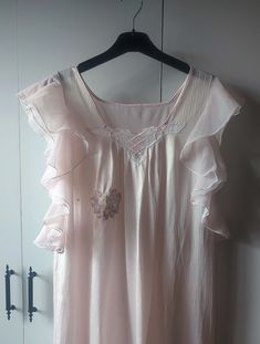 Vintage clothing, very light lavender pink nylon nightgown white lace neckline Dimensions were taken while they were straight. don't forget to double between the armpit to armpit about 22" doubled 44" waist 22" hips 23" length: 53- 54"" 135cm Material: polyester mix. no tag Condition: Used item. good conditon, There is wear on the right breast, sequin lace flower applique was sewn on it by me. The interior can be seen in the photos. There are slight thread pulls on the fabric. armholes are much Feminine Sleeveless Sleepwear For Wedding Night, Delicate Summer Nightgown For Sleep, Delicate Summer Sleep Nightgown, Sheer Feminine Camisole Nightgown, Summer Delicate Sleeveless Sleepwear, Feminine Sleeveless Nightgown For Wedding Night, Pink Camisole Nightgown For Wedding Night, Sleeveless Ruffled Sleepwear For Wedding Night, Pink Ruffled Nightgown For Sleep