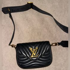 This Is An Authentic Louis Vuitton Calfskin New Wave Multi Pochette In Black. This Chic Shoulder Bag Is Crafted Of Quilted Calfskin Leather In Black. The Shoulder Bag An Adjustable Shoulder Strap, And Aged Gold Hardware. The Top Flap Opens To A Black Microfiber Interior With A Patch Pocket Black Crossbody Louis Vuitton, Louis Vuitton Multi Pochette Black, Black Louis Vuitton Key Pouch, Black Louis Vuitton Wallet, Louis Vuitton New Wave Multi-pochette, Louis Vuitton Black Monogram Bag, Authentic Louis Vuitton, New Wave, Gold Hardware