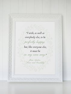 a white frame with a quote on it