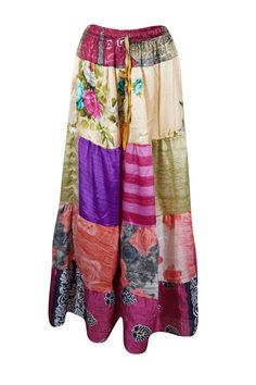 Add a pop of seasonal color to your wardrobe with this eye-catching flared maxi skirt! Made from upcycled saree fabric in a vibrant blend of Pink, Multi bold floral designs, and multi-hued patterns, each skirt is a unique statement piece. The ankle-length flowy silhouette and adjustable drawstring waist ensure both comfort and style, making it perfect for anything from farmer’s market strolls to beachside festival twirls. Crafted with sustainability in mind, this eco-friendly, boho-chic skirt ef Boho Chic Skirts, Skirt Patchwork, Flare Maxi Skirt, Chic Skirt, Chic Skirts, Boho Skirts, Saree Fabric, Season Colors, Floral Designs