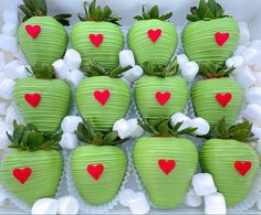 green strawberries with red hearts and marshmallows on them