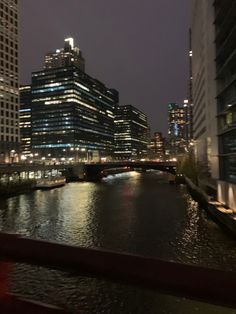 a river running through a city at night