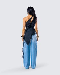 Be on your chicest behavior in this stylish two-piece set 🖤 Pairing a black mesh ruffle top with blue cargo denim pants, this look is perfect for a night out with the girls and some free drinks 😚 Chic Party Bottoms With Frayed Hem, Chic Jeans For Night Out In Summer, Chic Jeans For Summer Night Out, Chic Party Jeans For Summer, Chic Summer Party Jeans, Chic Party Jeans, Black Denim Jeans For Party, Chic Party Jeans For Spring, Chic Spring Party Jeans