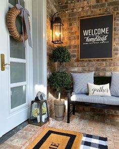 a welcome sign on the front door of a home