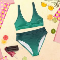 🌊🌴 Get ready to make a splash with our eco-friendly sport bikini! Designed with both style and sustainability in mind, this high-waisted bikini is crafted from ♻️ recycled polyester, making it a perfect choice for eco-conscious fashionistas who want to make a statement. 🌸🌿We believe in the power of recycling, which is why we carefully select and transform discarded plastic bottles into a luxurious and durable textile for this bikini. ♻️🌍 By choosing this sport bikini, you not only get a tre Sporty Cropped Swimwear For Beach, Sporty Cropped Swimwear For Swimming, Green Sporty Swimwear For Sunbathing, Sporty Green Swimwear For Sunbathing, Cropped Sports Swimwear For Beachwear, Cropped Sports Beachwear Swimwear, Cropped Beachwear Swimwear, Summer Swimwear For Water Sports, Bra Friendly, Cropped Swimwear For Poolside And Beach Season