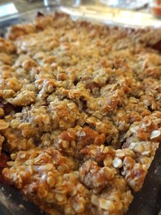 an oatmeal and raisin crumb topping on a baking pan