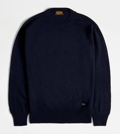 Seamless round-neck pullover in cashmere blend knit. A refined autumn-winter wardrobe evergreen, enriched by the leather tag on the bottom with stamped Tod's logo. Leather Tag, Blue Back, Gift Boutique, Trainers Women, Winter Wardrobe, Autumn Winter, Knitwear, Ready To Wear, Jumper