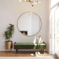 a living room with a large round mirror on the wall and a bench in front of it