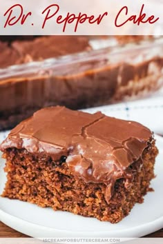 a close up of a piece of cake on a plate with the words dr pepper cake