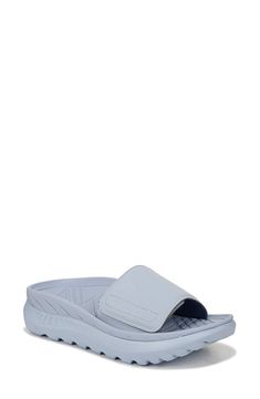 As easy to wear as it is comfortable, this slip-on sandal is a go-to for all kinds of casual situations. 2 1/4" heel Synthetic upper, lining and sole Imported Sporty Summer Slip-ons With Arch Support, Synthetic Slip-on Slide Shoes, Synthetic Slide Slip-ons, Summer Slip-ons With Arch Support In Synthetic Material, Summer Synthetic Slip-ons With Arch Support, Summer Slip-ons With Arch Support, Synthetic Slip-on Sandals, Comfortable Slip-on Slides With Arch Support, Spring Sport Sandals With Gel Cushioning And Open Toe