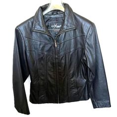 Vintage Maxima Black Leather Women's Moto Jacket Size S This is a stunning black leather moto jacket by Maxima, featuring soft and supple leather that exudes both style and quality. Size: Small Color: Black Material: Leather Construction: Fully lined Style: Waist-length fitted motorcycle jacket Zipper front closure Top stitch accents Front pockets with hidden side openings Condition: Very good used condition. This jacket looks like new with NO holes, tears, or stains. Measurements: Length: 25" (from top of shoulder to bottom hem) Bust: 18" (from armpit to armpit) Sleeve: 22.5" (shoulder to end of sleeve) This versatile jacket is perfect for various occasions, whether you're going for a casual look, embracing the moto style, or adding a touch of chic to your outfit. The item in the photos i Black Moto Jacket Scarf, Womens Moto Jacket, Black Leather Moto Jacket, Moto Vintage, Biker Chic, Jacket Zipper, Moto Style, Leather Moto, Leather Moto Jacket