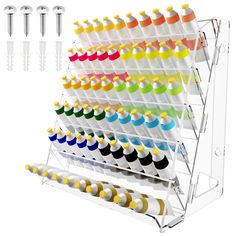 a rack filled with lots of different colored thread