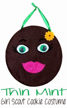 a close up of a face on a bag with the words, thin mint girl scout cookie costume