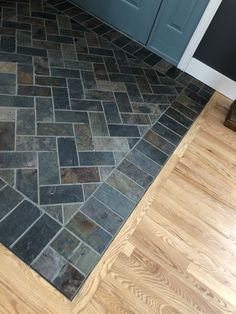 a kitchen floor that has been cleaned and is in the process of being remodeled with wood floors