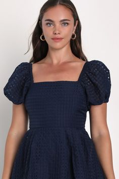 Your darling personality will be irresistible in the Lulus Certain Charisma Navy Blue Textured Puff Sleeve Midi Dress! Sturdy woven fabric, with a burnout checkered texture, shapes short puff sleeves with elastic at the cuffs and shoulders. Square neckline tops a darted bodice with a high waist and a wide sash tie. Pleated details lend a voluminous silhouette to the A-line skirt, ending at a midi hem. Hidden zipper/clasp at back. Fit: This garment fits true to size. Length: Mid-calf length. Size Puff Sleeve Midi Dress, Be Irresistible, Lulu Fashion, Adhesive Bra, Textured Dress, Puff Sleeve Dress, Sleeve Midi Dress, Strapless Bra, Full Skirt