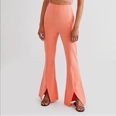 Free People Real Deal High Waist Front Slit Flare Pants In Sundried Orange Coral. New Without Tags! Forever Classic With A Cool And Contemporary Touch, These So Flattering Pants Are Featured In A High-Rise, Flare Silhouette With Front Slit Feature For Added Dimension. Effortless, Pull-On Style Seaming For Added Shape High-Rise Design Free People Jumpsuit, Flower Pants, Printed Flare Pants, Flattering Pants, Cropped Flare Pants, Velvet Flares, Pant Trends, Boho Pants, Flare Leg Pants