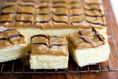 several pieces of cake sitting on top of a cooling rack