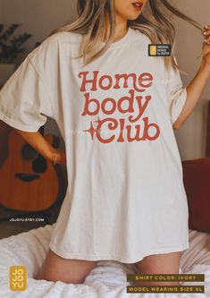 Homebody Club Retro Style Tee - Comfort Colors Unisex T-shirt Design by jojoyu. This item is made to order. If you want an oversized fit please size up one or two sizes! for reference, the model in the first photo is usually a medium but wearing XL for an oversized fit. Please note that the colors on the actual shirt might slightly differ from the photos. This is due to different color display on different devices, monitors, as well as the colors of an image may be affected by different lighting Homebody Club, Homebody Shirt, Cute Lounge, Music Merch, Home Cozy, Retro Funny, Music Life, Capsule Outfits, Retro Humor