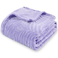 a purple blanket folded on top of each other