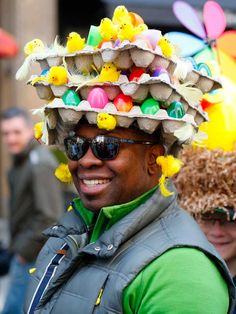 a man wearing a hat made out of eggs