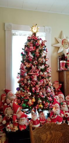 a christmas tree with santa clause decorations