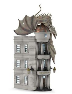 a model of a building with a dragon on top