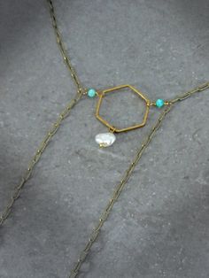 Capture the impactful symbology of natural gemstones with this artisan paperclip chain bolo necklace. Adorned with a single natural keshi pearl, genuine Arizona Sleeping Beauty turquoise, micro faceted amazonite rounds & a hammered hexagon, this intentional necklace reflects the symbolism found throughout life's journey. Embrace the essence of the Desert & the Sea with peace of mind knowing this necklace was handcrafted in the USA with ethically sourced gemstones that tell a unique story. Baroque Keshi Pearl Paperclip Chain Bolo Necklace Ft. Genuine Arizona Sleeping Beauty Turquoise (Necklace Only): ✿ Antiqued brass, raw USA brass, natural baroque freshwater keshi pearl, genuine Arizona Sleeping Beauty turquoise, micro faceted Peruvian amazonite Please note - Items are made with raw bronze Bolo Necklace, Sacred Stones, Arizona Turquoise, Sleeping Beauty Turquoise, Keshi Pearls, Genuine Turquoise, Des Moines, The Desert, Paper Clip