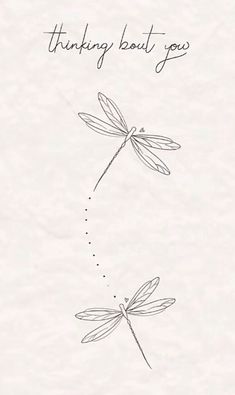 two dragonflies flying in the sky with words on it that say, thinking about you