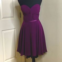 Bring On The Fall Wedding Colors! Nwt Cinderella Divine Eggplant Purple Plum Bridesmaid Mini Dress, Sweetheart Neckline Sz 10. Flowy, Chiffon-Feel, Fully Lined, Wedding Bridesmaid Or Mother Of The Bride Dress. Also, Great For Wedding Guest Attire Or Christmas, Holiday Parties! This Is A Gorgeous Dress. Beautiful Crisscross Rouching In The Front And A Corset Tie Back Makes Adjusting The Fit A Breeze. Smoke-Free Home, No Flaws. Sheer, Wrap Scarf For Shoulders Shown In Photos. Measurements In Last Photo. Approximate. Video Shows How The Dress Falls, Lightweight, Elegant. Available In Three Sizes 10, 14, 16. All Measurements Shown. The Last Photo Is A Stock Photo (Not Eggplant) That Shows The D Bridesmaid Mini Dresses, Corset Tie Back, Plum Bridesmaid, Wedding Guest Attire, Dress Sweetheart Neckline, Cute Floral Dresses, Cinderella Divine, Black Long Sleeve Sweater, Long Sleeve Tunic Dress