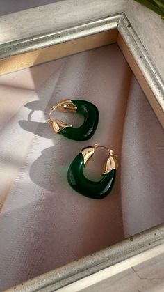 Express your individuality with earrings that resonate with your personal style. Whether you prefer minimalist elegance or bold, statement pieces, our collection invites you to curate your own narrative through the language of jewelry. 𝐌𝐀𝐓𝐄𝐑𝐈𝐀𝐋: 18k Gold filled and Lightweight green acrylic. 𝐂𝐀𝐑𝐄 𝐓𝐈𝐏𝐒: Avoid contact with moisture (water, perfume and other chemicals) Mostly take off jewelry when exercising, showering, sleepingWhen not in use store your pieces in the jewelry bag or box. Water Perfume, Jewelry Bag, Green Earrings, Jewelry Bags, Care Tips, Chemicals, Statement Pieces, Gold Filled, Personal Style