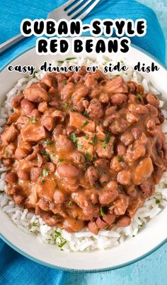 a white plate topped with rice covered in red beans