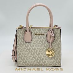 Brand New With Tag Michael Kors Mercer Medium Crossbody Messenger Bag Color: Powder Blush Multi/Vanilla Gold Tone Hardware Crossbody Bag Pvc And Pebbled Leather 100% Leather Gold-Tone Hardware 8.75”W X 7.5”H X 4”D Handle Drop: 4.25” Adjustable Strap: 22.25”-24.5” Exterior Details: Removable Strap Interior Details: 2 Open Compartments, Center Zip Compartment, 3 Card Pockets Lining: 100% Polyester Dust Bag Not Included Imported Luxury Bags Collection, Michael Kors Mercer, Michael Kors Crossbody Bag, Exterior Details, Black Crossbody Purse, Brand Bags, Powder Blush, Pretty Bags, Color Powder