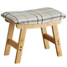 a wooden stool with a checkered seat cover on it's backrest and legs