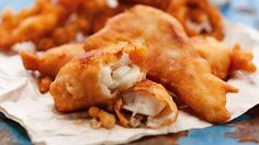 some fried food is laying out on a table