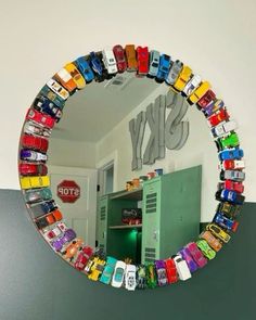 there is a mirror that has cars on it and the reflection of a school locker