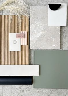 the top view of a table with various items on it, including a light switch