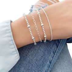 Dainty Sterling silver Bracelets For Women light weight and adjustable with beautiful sterling silver finish.  *Sterling silver stacked set of 4*   Sterling silver stretch bracelets beaded with 2mm, 3mm and 5mm beads. Great to wear alone or layered with other bracelets. Bracelet measuring about 6 1/2-7 inches with stretch please contact for custom sizing. Set includes  1x Chain Bracelet  2x 3mm & 5mm Bracelet  1x 2mm Bracelet  *Price is for all 4 bracelets*  please contact for custom sizing* ~Ad Minimalist Stackable Silver Chain Bracelet, Dainty Sterling Silver Bracelet With Silver Beads For Everyday, Dainty Silver Beaded Bracelets, Delicate Sterling Silver Beaded Bracelets, Delicate Hypoallergenic Silver Beaded Bracelets, Dainty Jewelry Bracelets, Silver Bracelet Chain, Silver Beaded Bracelet, Bracelets Beaded