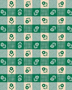 a green and white checkered pattern with flowers