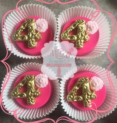 pink cupcakes decorated with gold numbers and flowers