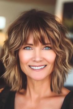 Save this pin for the best shag hairstyles for women over 50. Full of tousled texture, this choppy shag offers a playful take on the classic cut. The piecey layers give it that tousled look, making the hair feel lifted and full of movement. Women’s Layered Medium Hair, Messy Bob Hairstyles Choppy Layers, Joy Behar Hairstyles, Medium Shag With Bangs Over 50, Short Layered Hairstyles Over 50, Shag Haircuts For Wavy Hair, Mid Length Hair With Layers And Bangs Shag Hairstyles, Shag Without Bangs Hairstyles, Thick Hair Shag Haircut