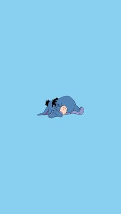 winnie the pooh laying on its back with her head up in the air, against a blue background