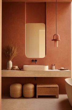 a bathroom with a sink, mirror and bathtub