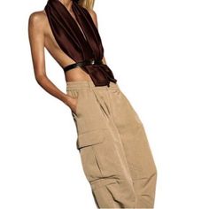 Nwt//Missed Return Window // Mid-Rise Pants With Elastic Waistband And Belt Loops. Front Pockets And Leg Flap Patch Pockets. Adjustable Elastic Drawstring Hem With Toggle. Questions? Leave A Comment Below! Chic Parachute Pants With Pockets, Chic Fitted Wide-leg Parachute Pants, High Waist Cargo Pants For Summer Night Out, High Waist Cargo Pants For Night Out In Summer, High Waist Summer Cargo Pants For Night Out, Chic Fall Parachute Pants, Chic Fitted High-waisted Parachute Pants, Chic High Waist Parachute Pants For Fall, Chic Baggy Brown Bottoms